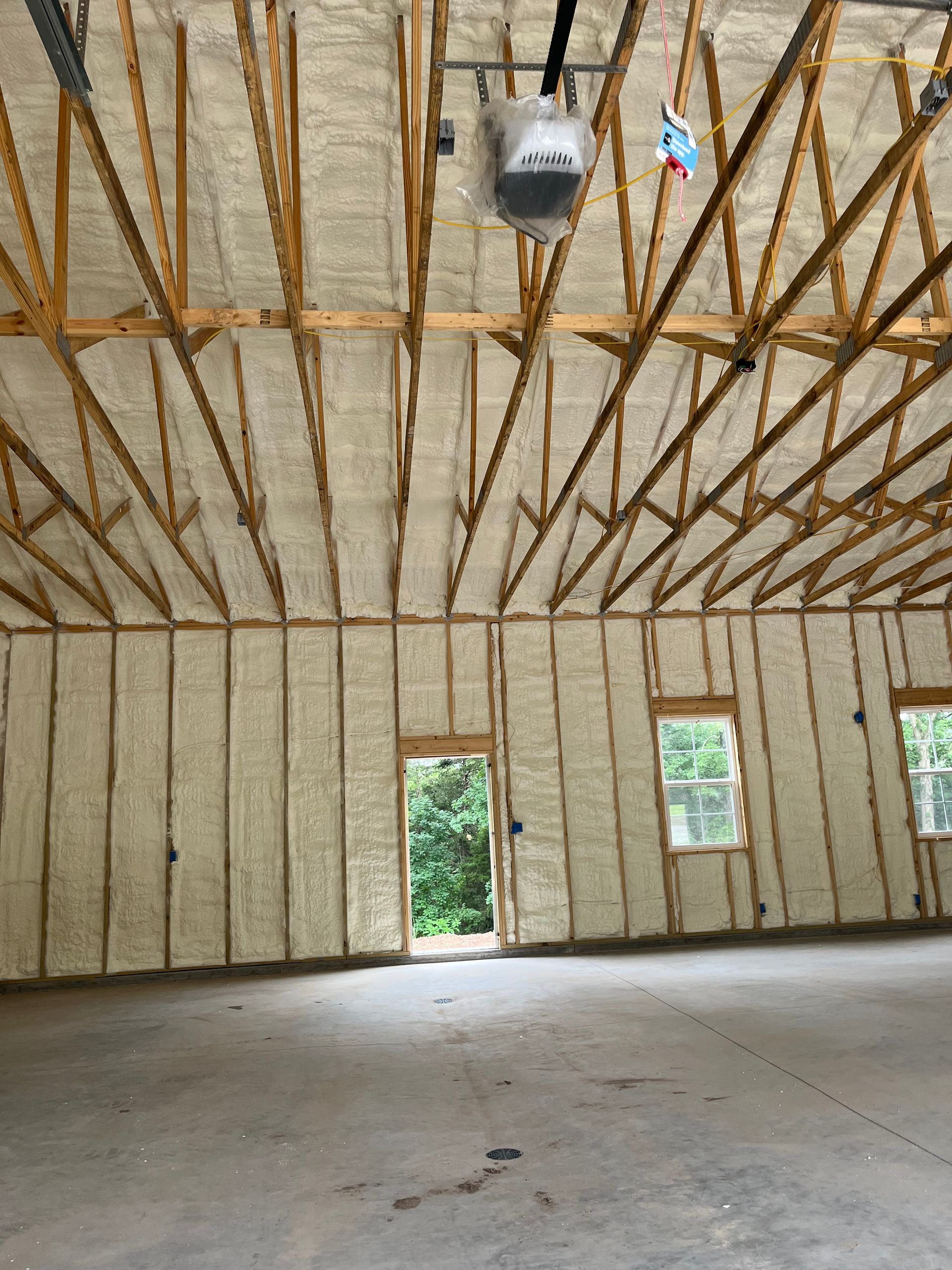 A garage with a lot of foam on the walls and ceiling.